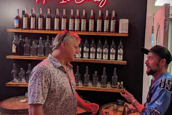 a man standing in front of a store